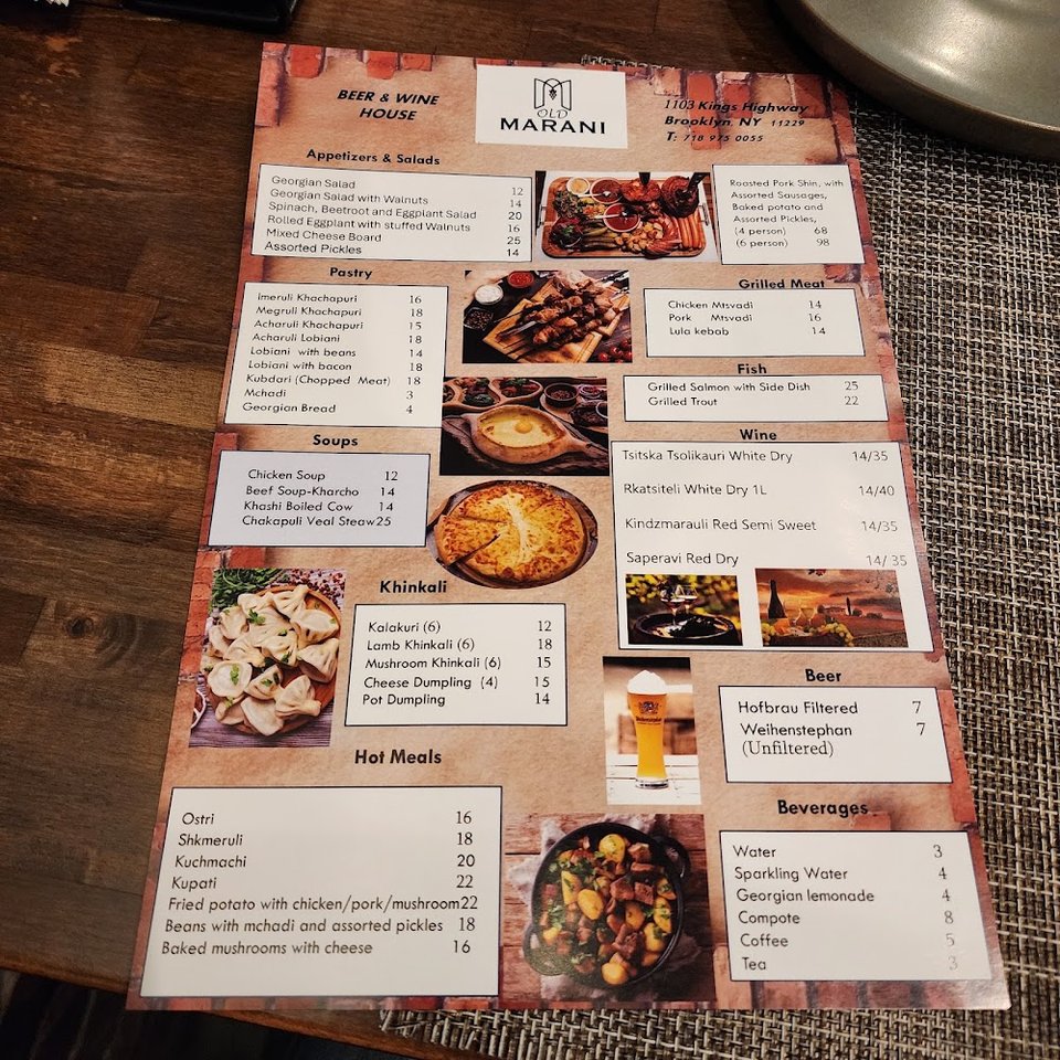 Food menu with soups, pastries, and wine.